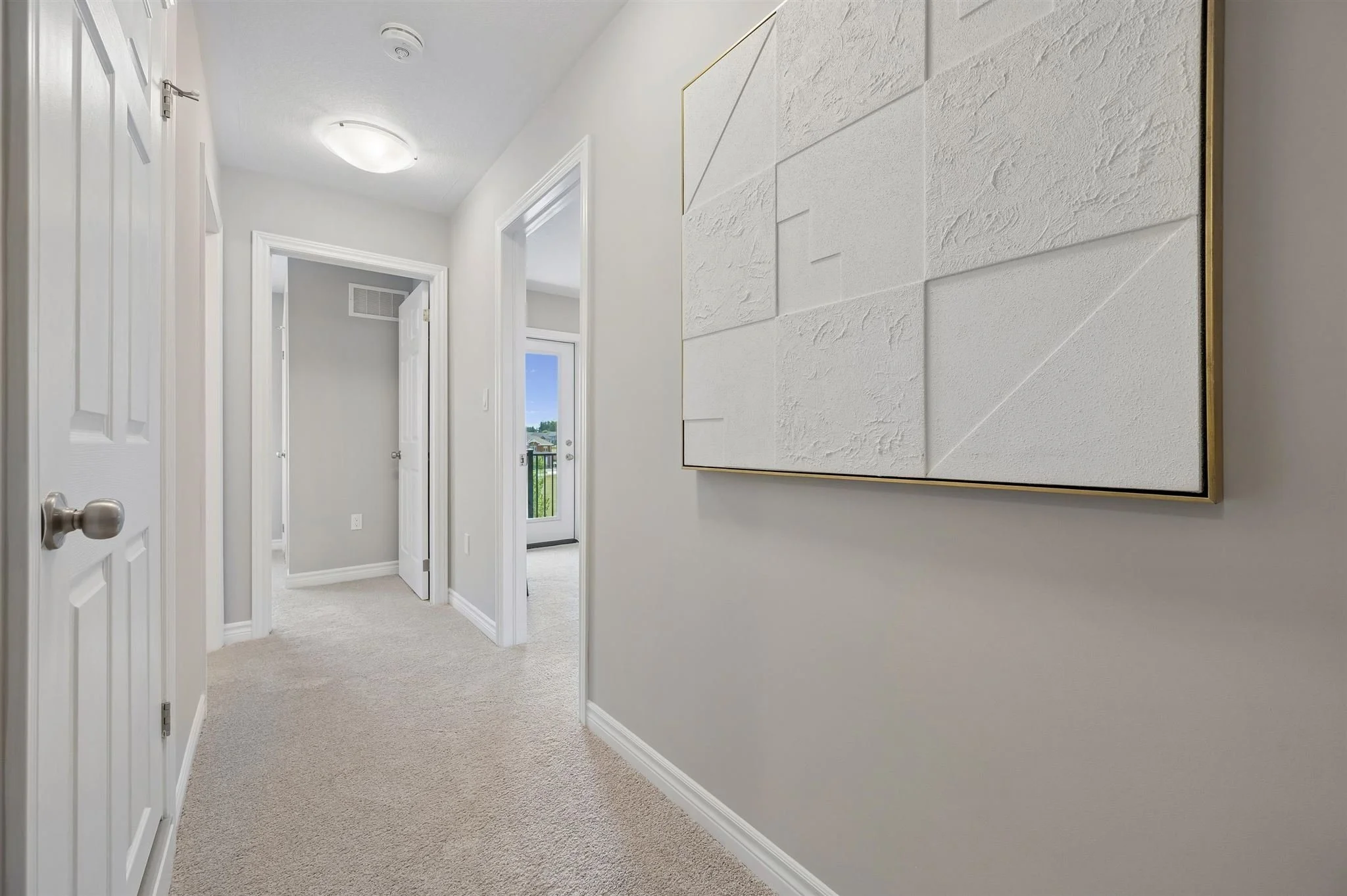 8 Oat Lane — Upper hallway with view to balcony walkout