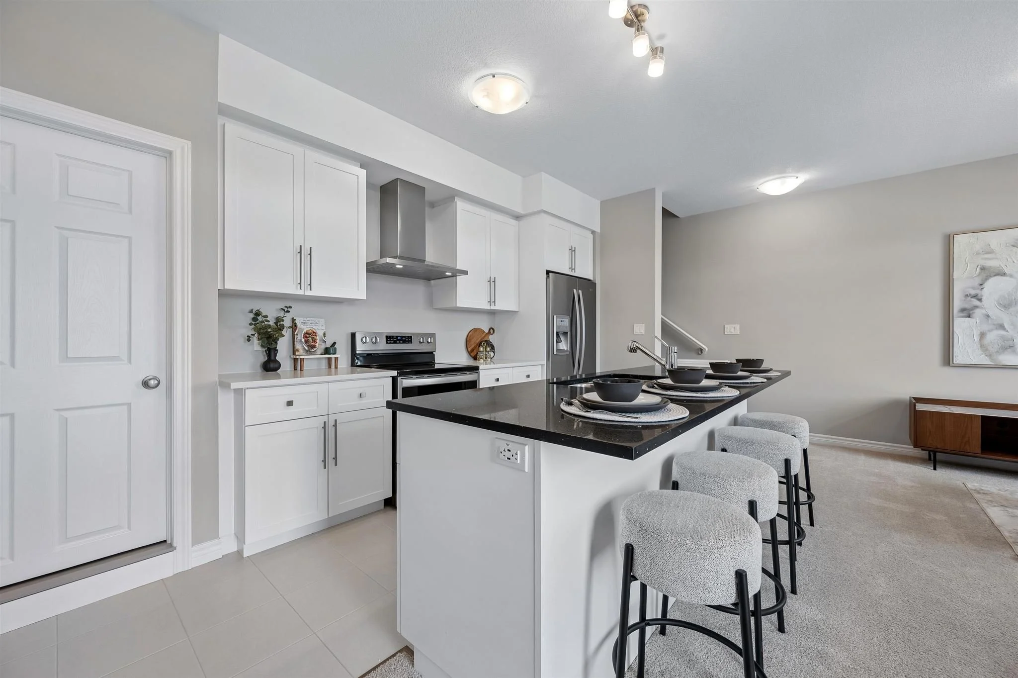 8 Oat Lane — Open-concept kitchen and living area