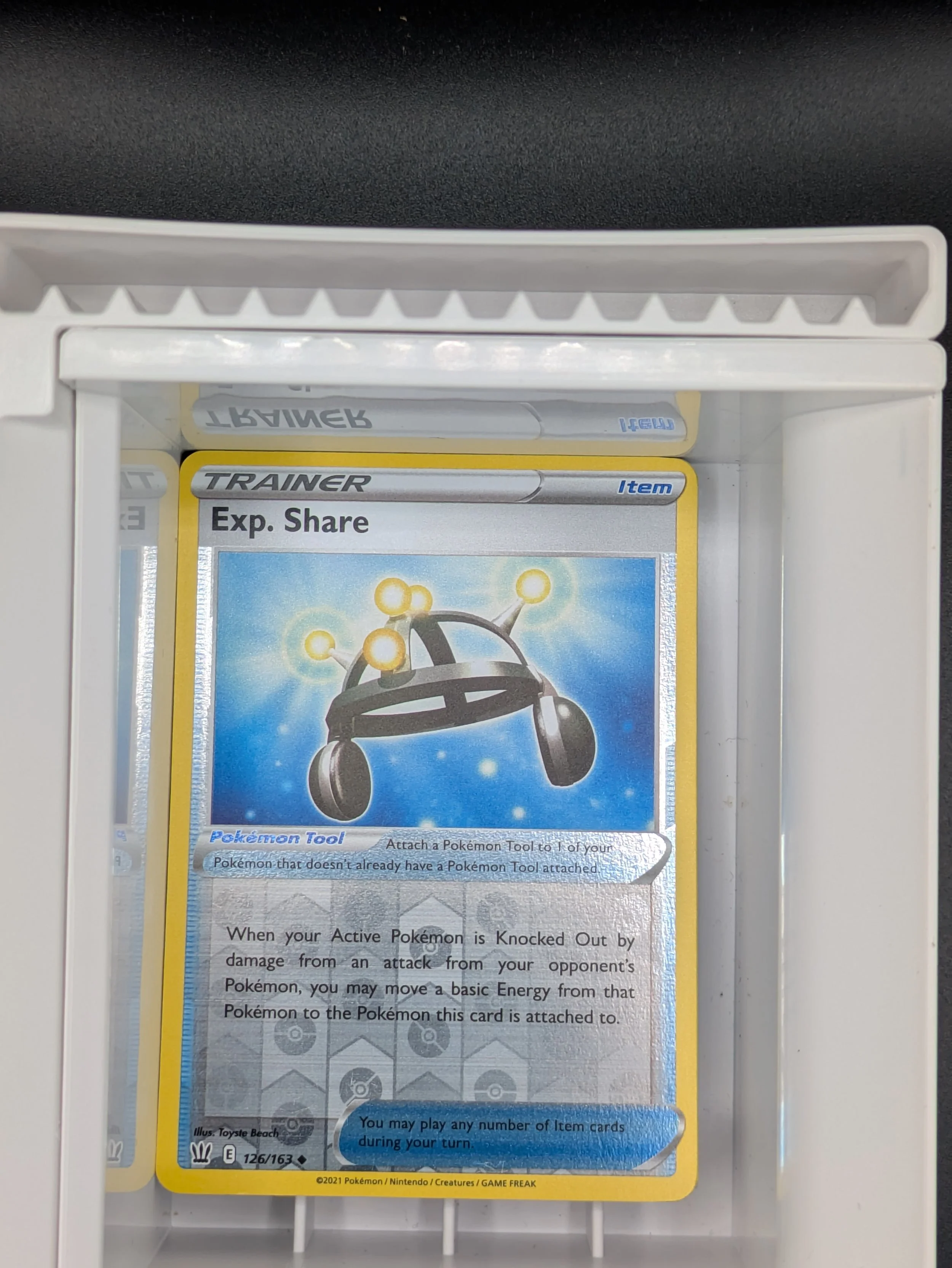 Exp. Share 126/163 Reverse Holo Light Played