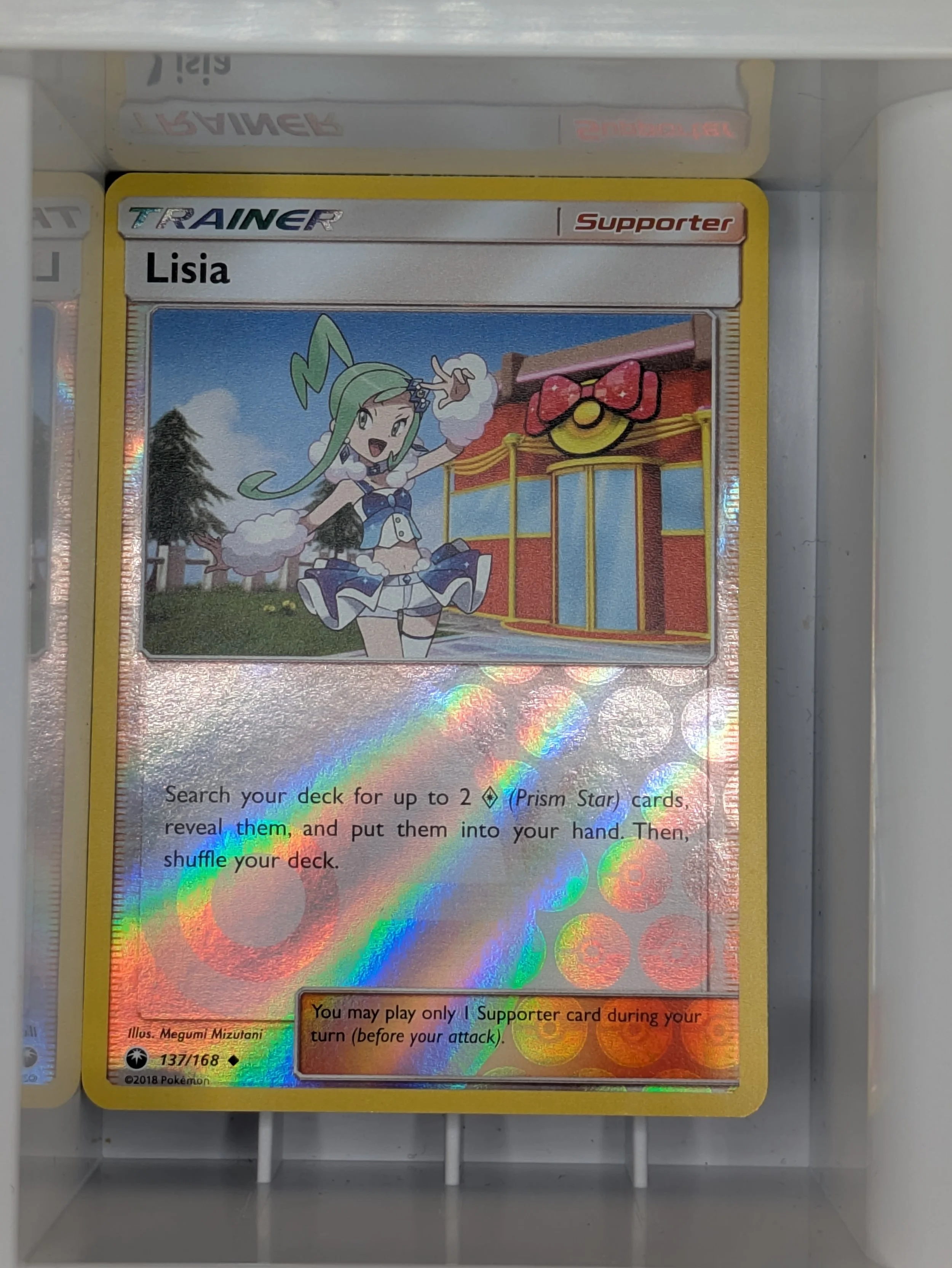 Lisia 137/168 Reverse Holo Light Played