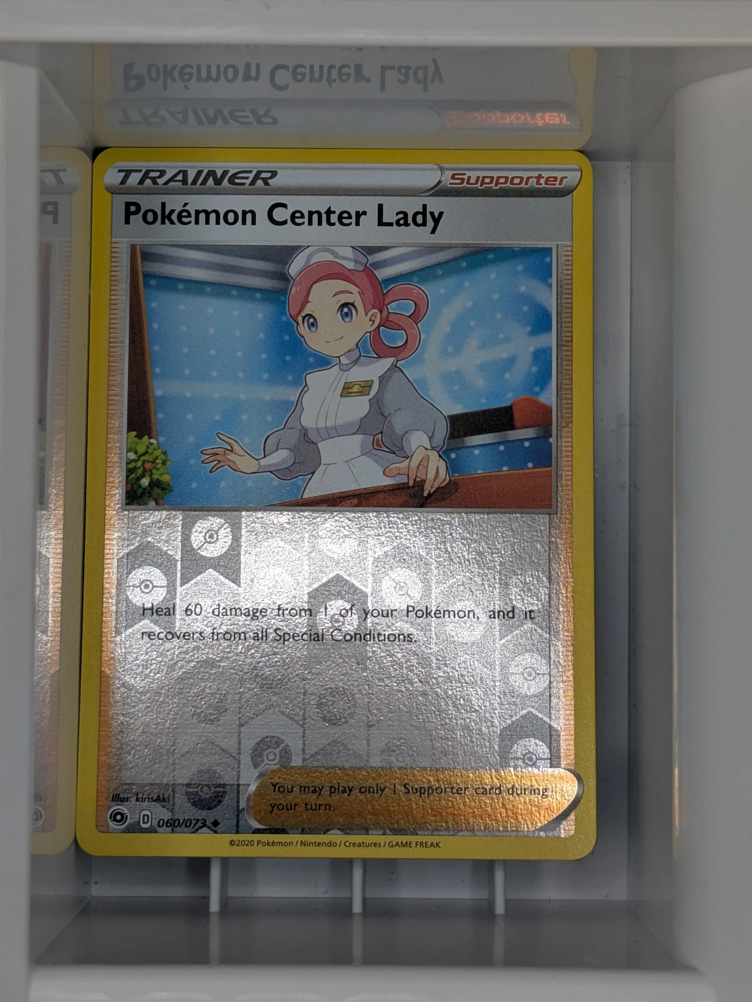 Pokémon Center Lady 60/73 Reverse Holo Light Played