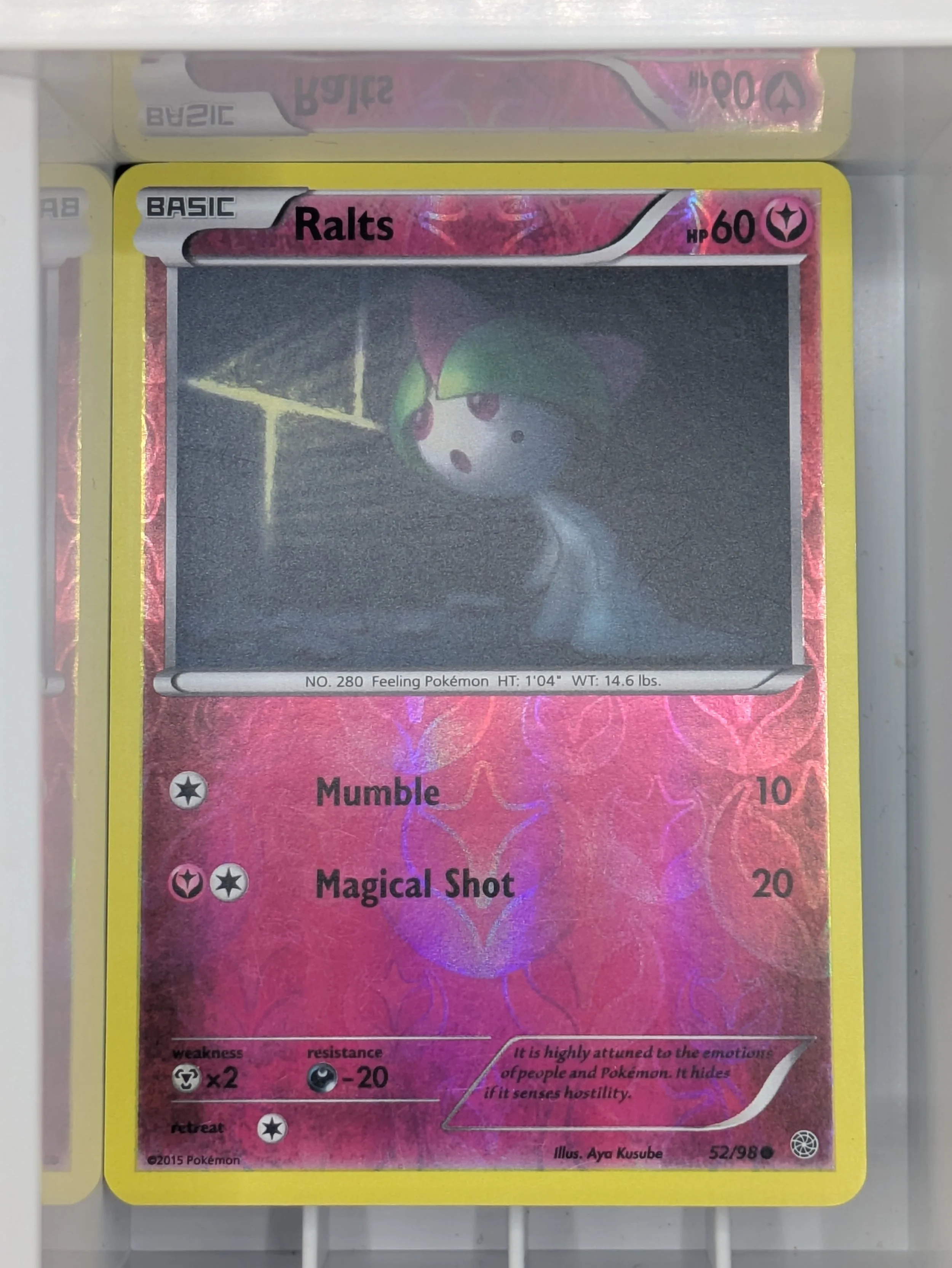 Ralts 52/98 Reverse Holo Light Played