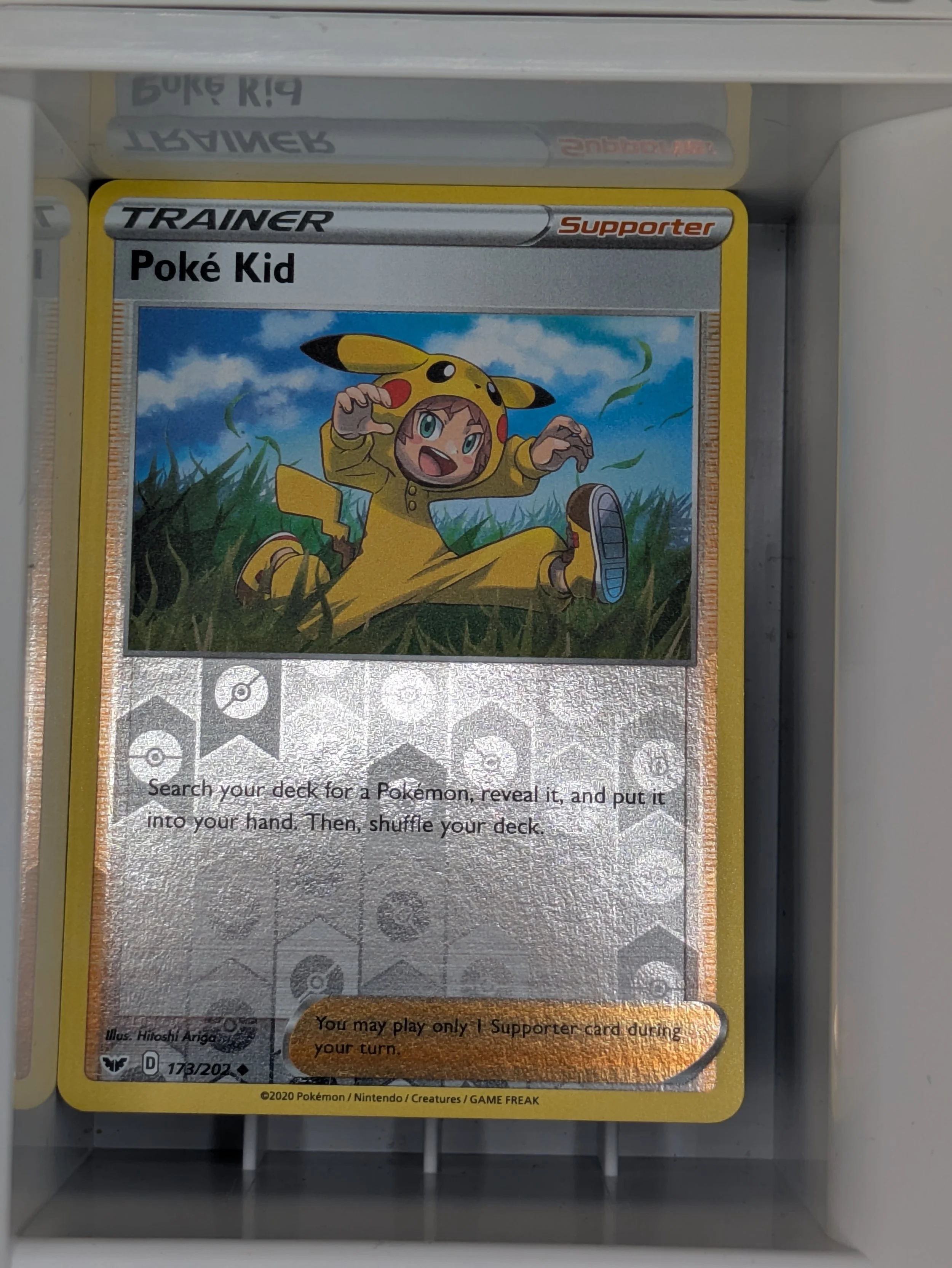 Poke Kid 173/202 Reverse Holo Light Played