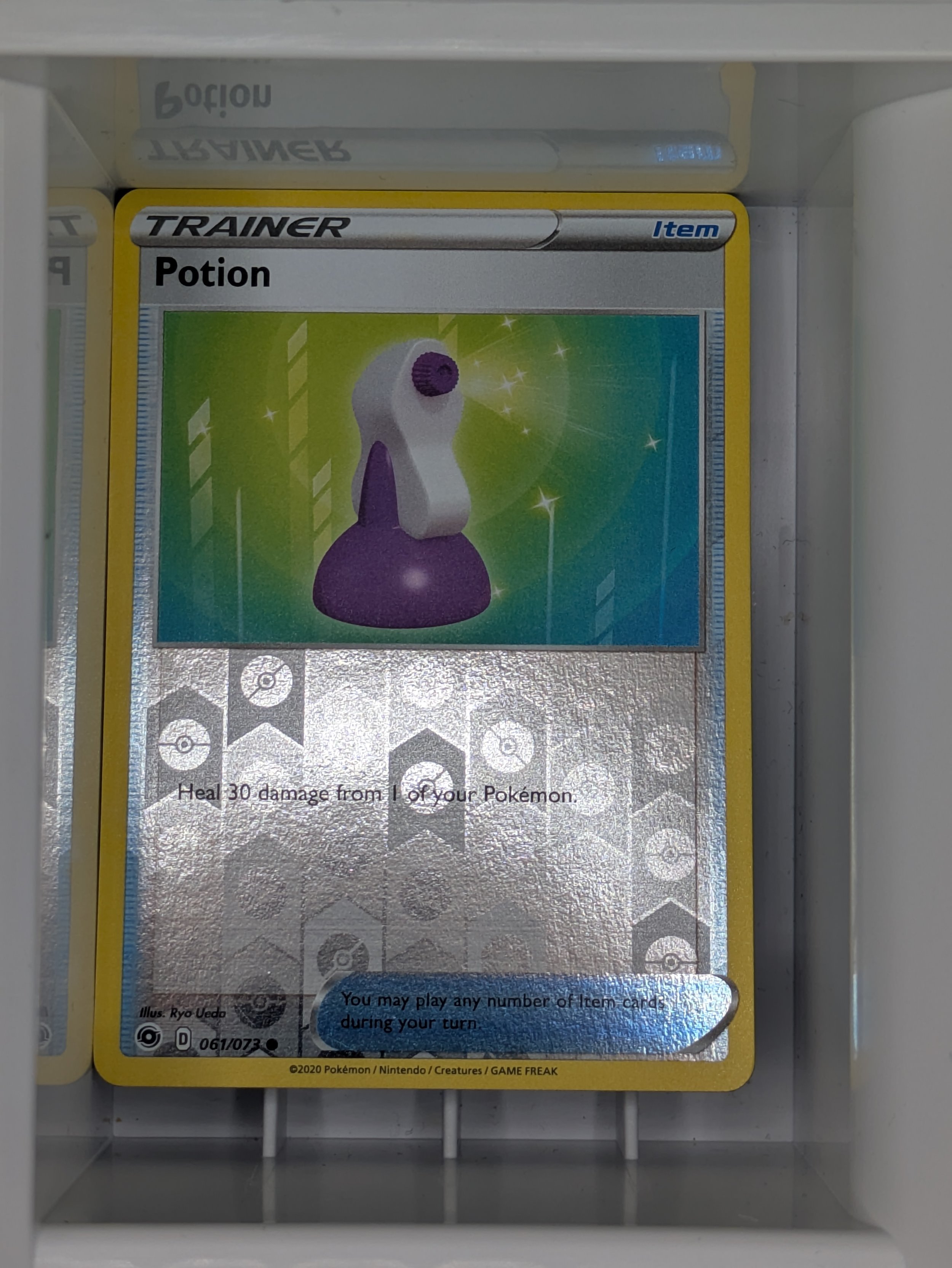 Potion 61/73 Reverse Holo Light Played