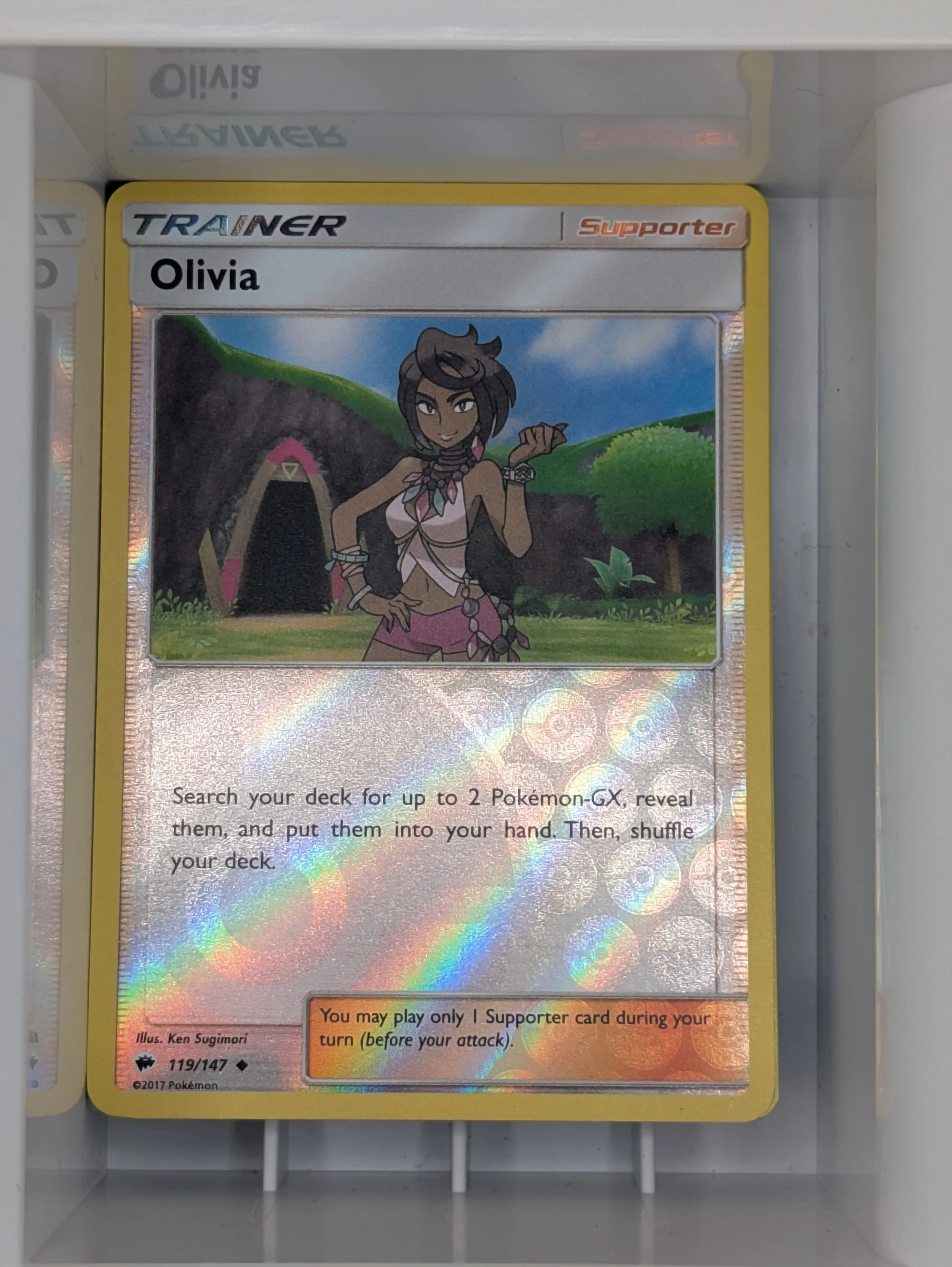 Olivia 119/147 Reverse Holo Light Played