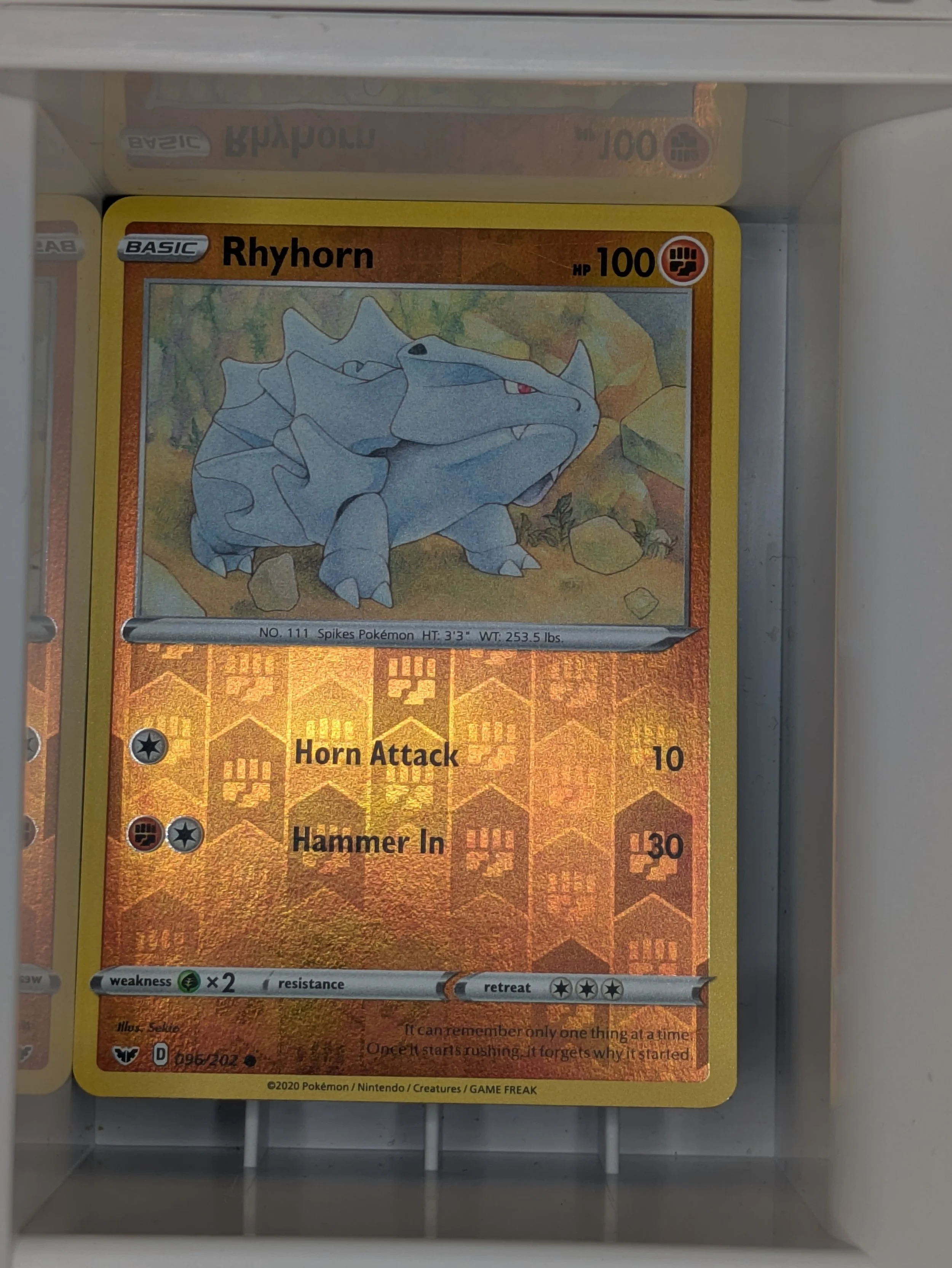 Rhyhorn 96/202 Reverse Holo Light Played