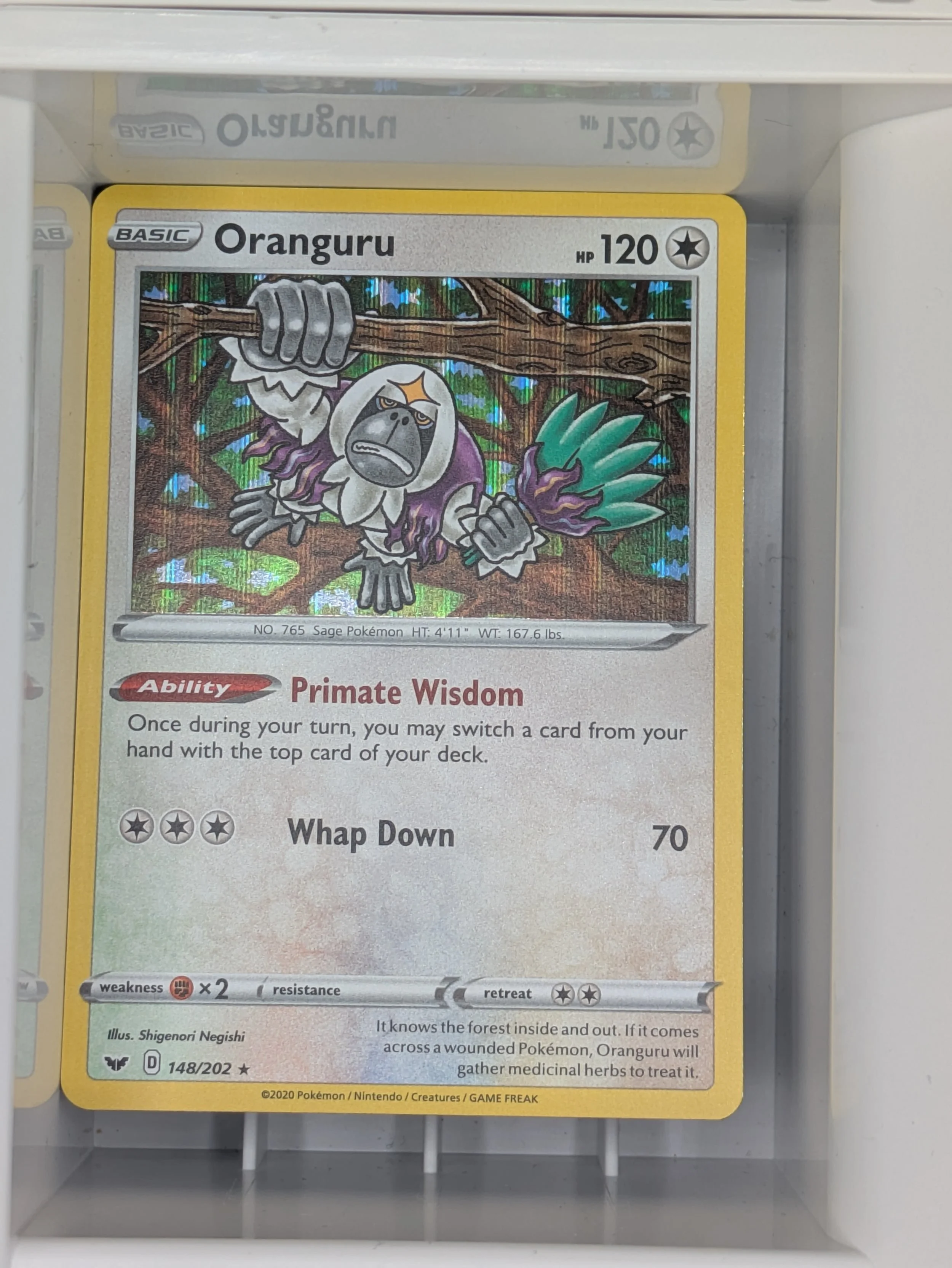 Oranguru 148/202 Holo Light Played