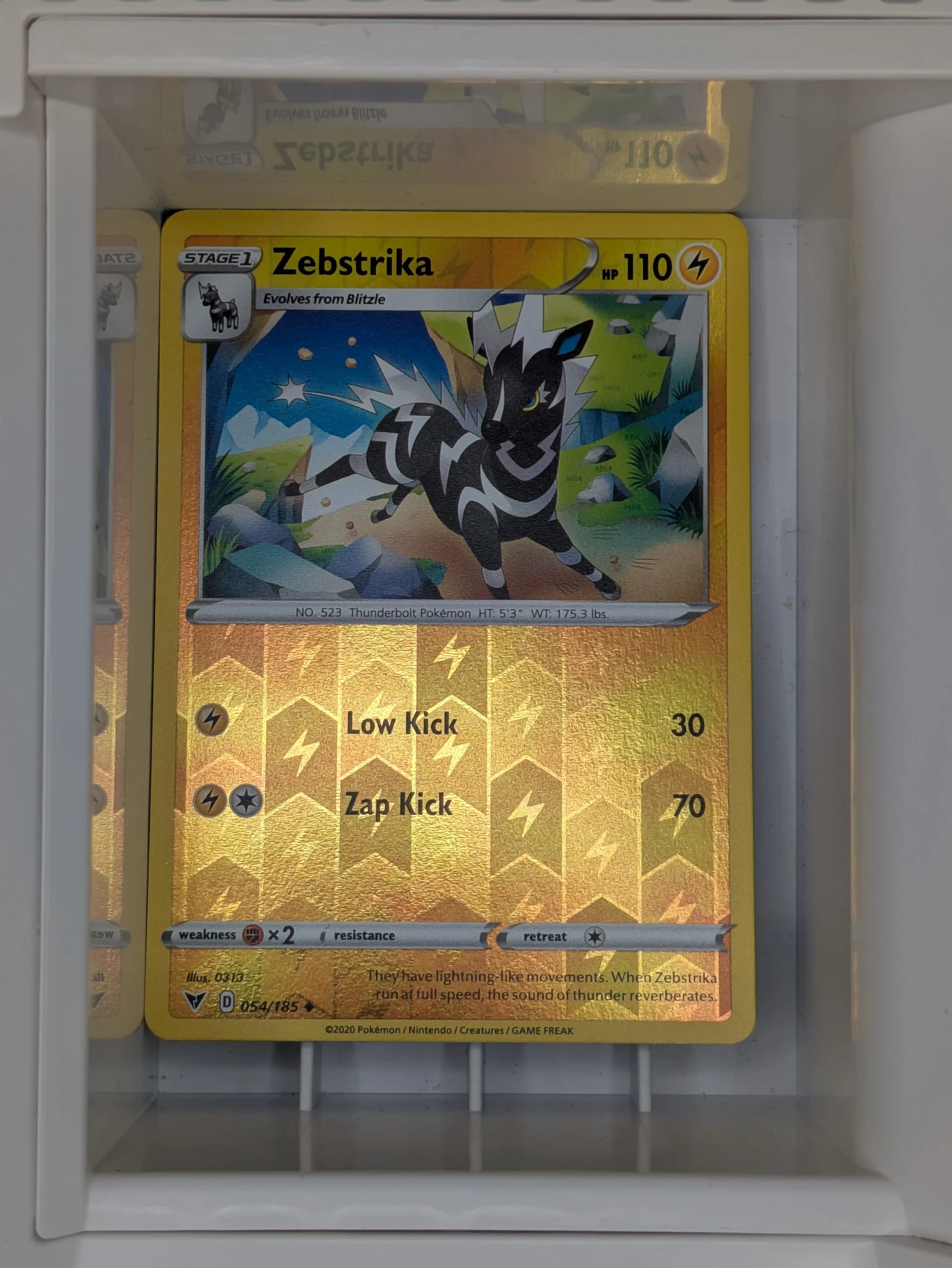 Zebstrika 54/185 Reverse Holo Light Played