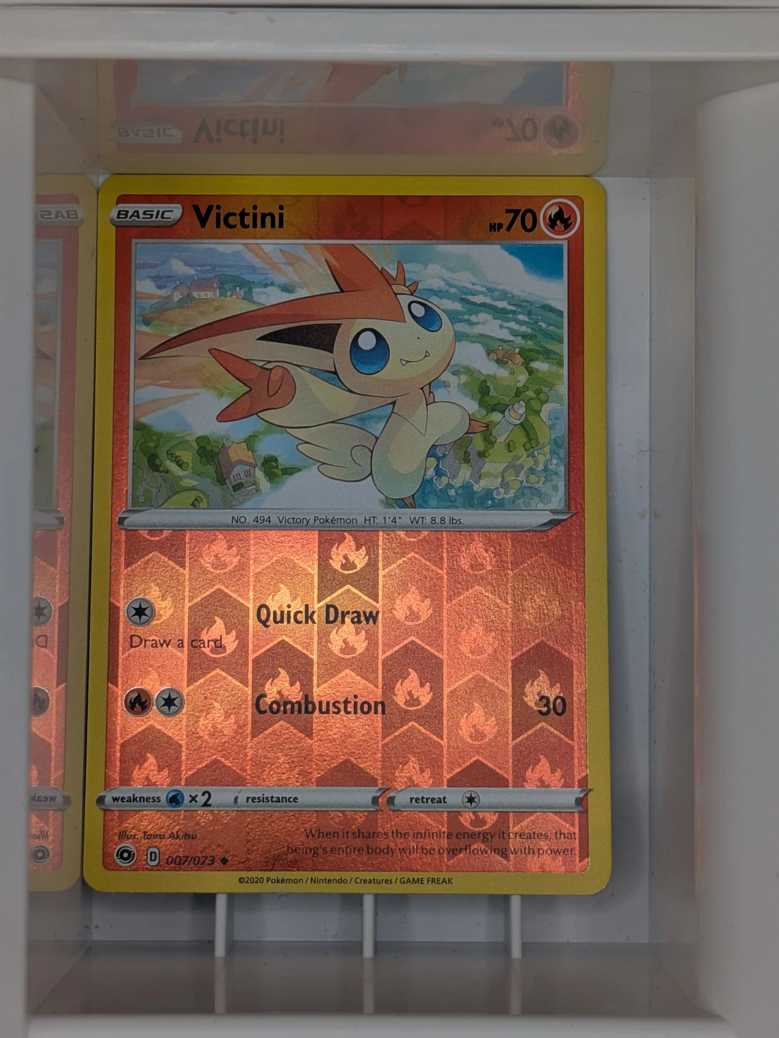 Victini 7/73 Reverse Holo Light Played