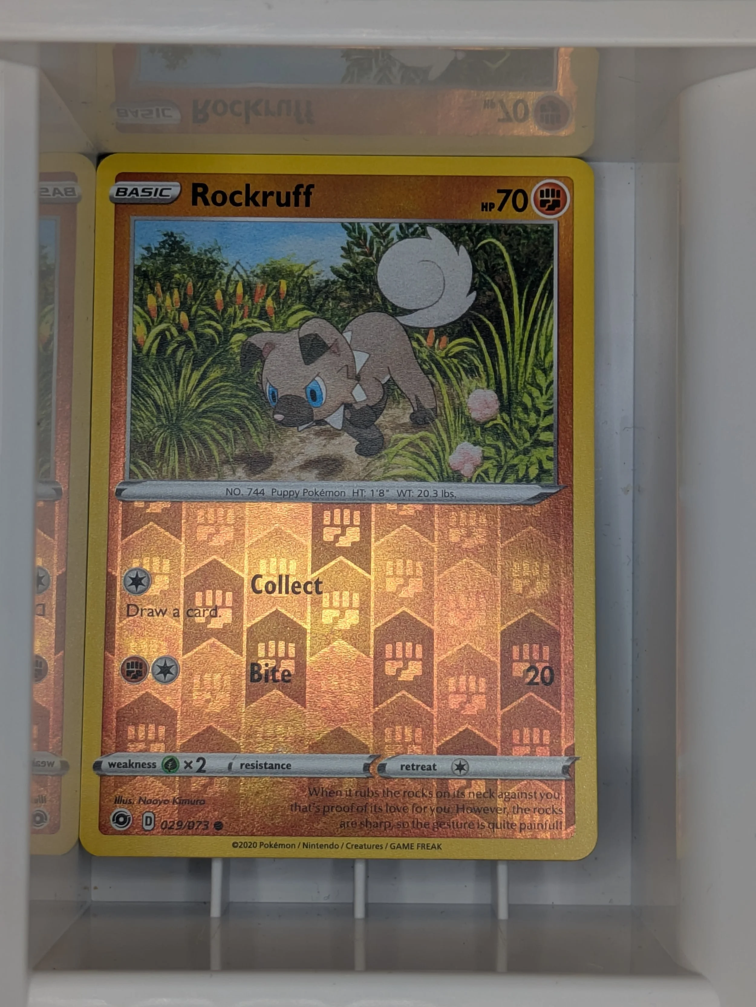 Rockruff 29/73 Reverse Holo Light Played