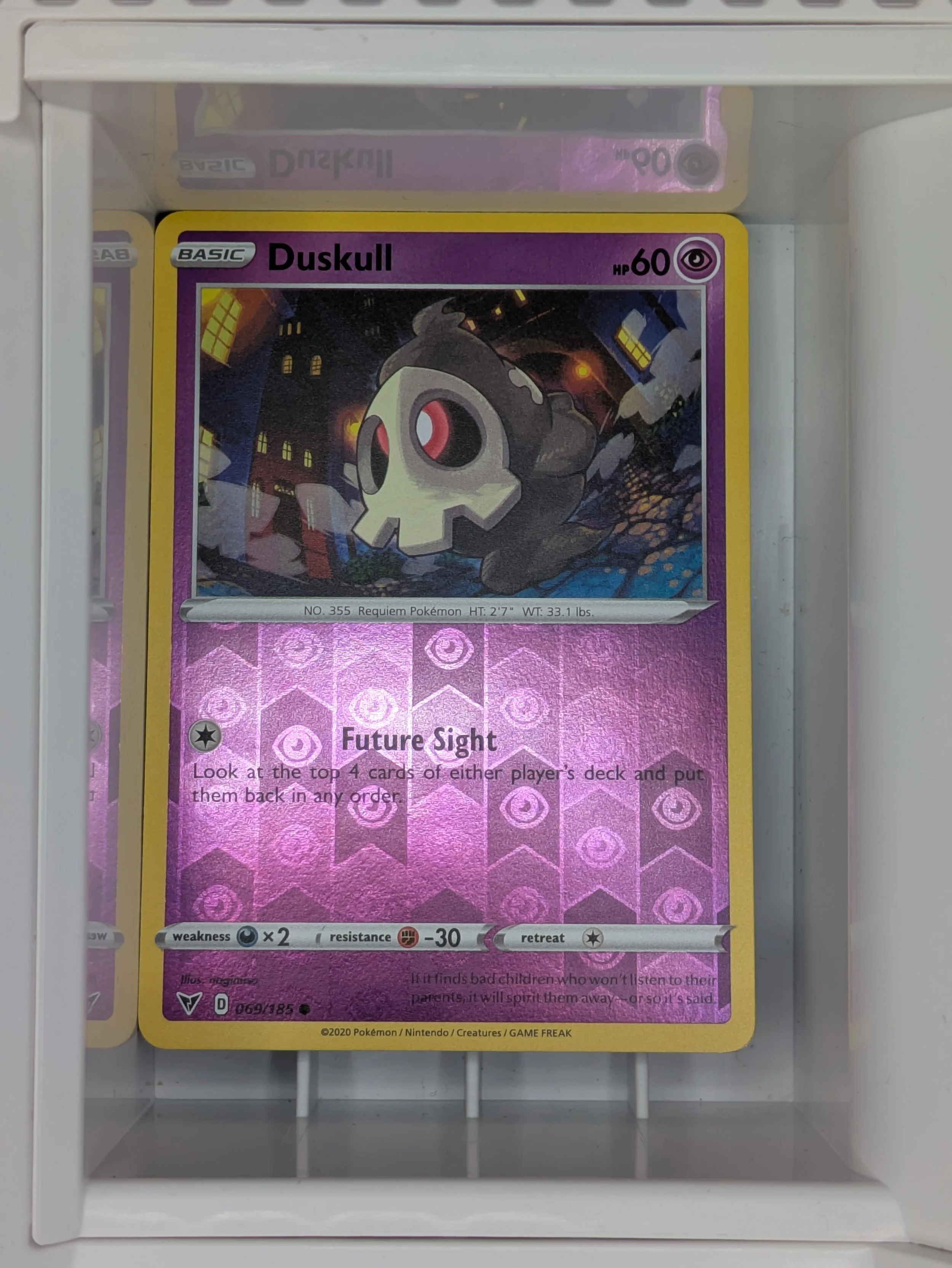 Duskull 69/185 Reverse Holo Light Played