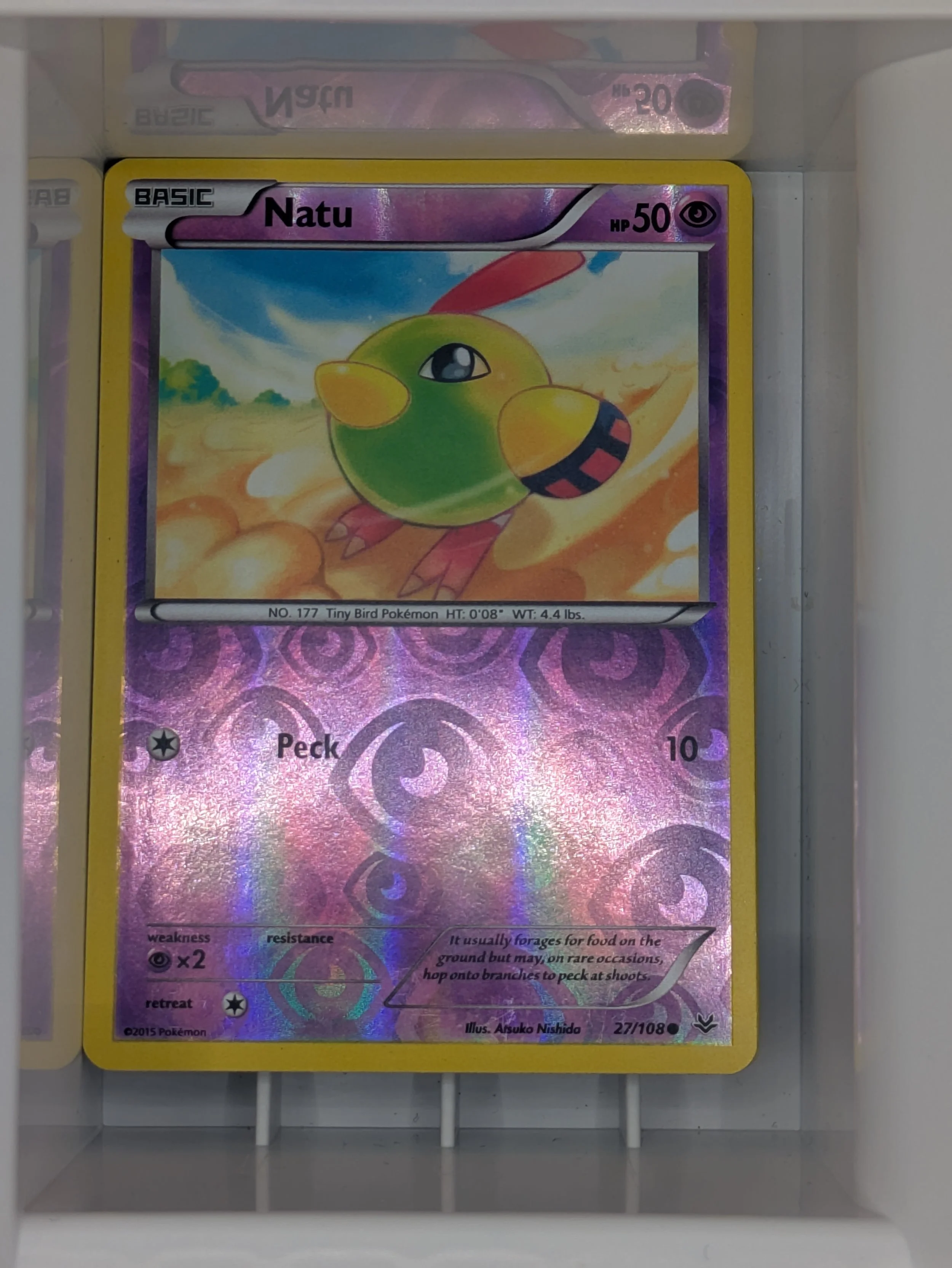 Natu 27/108 Reverse Holo Light Played