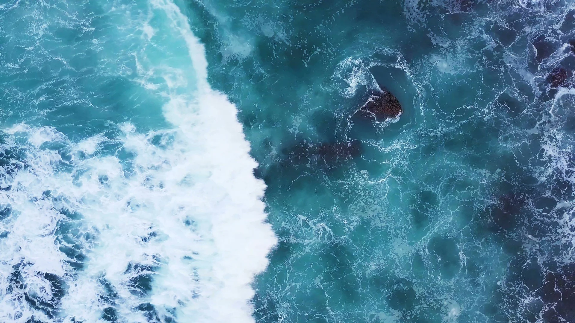 084785598-top-view-moving-away-ocean-blu_H264HD1080 - frame at 0m2s.jpg