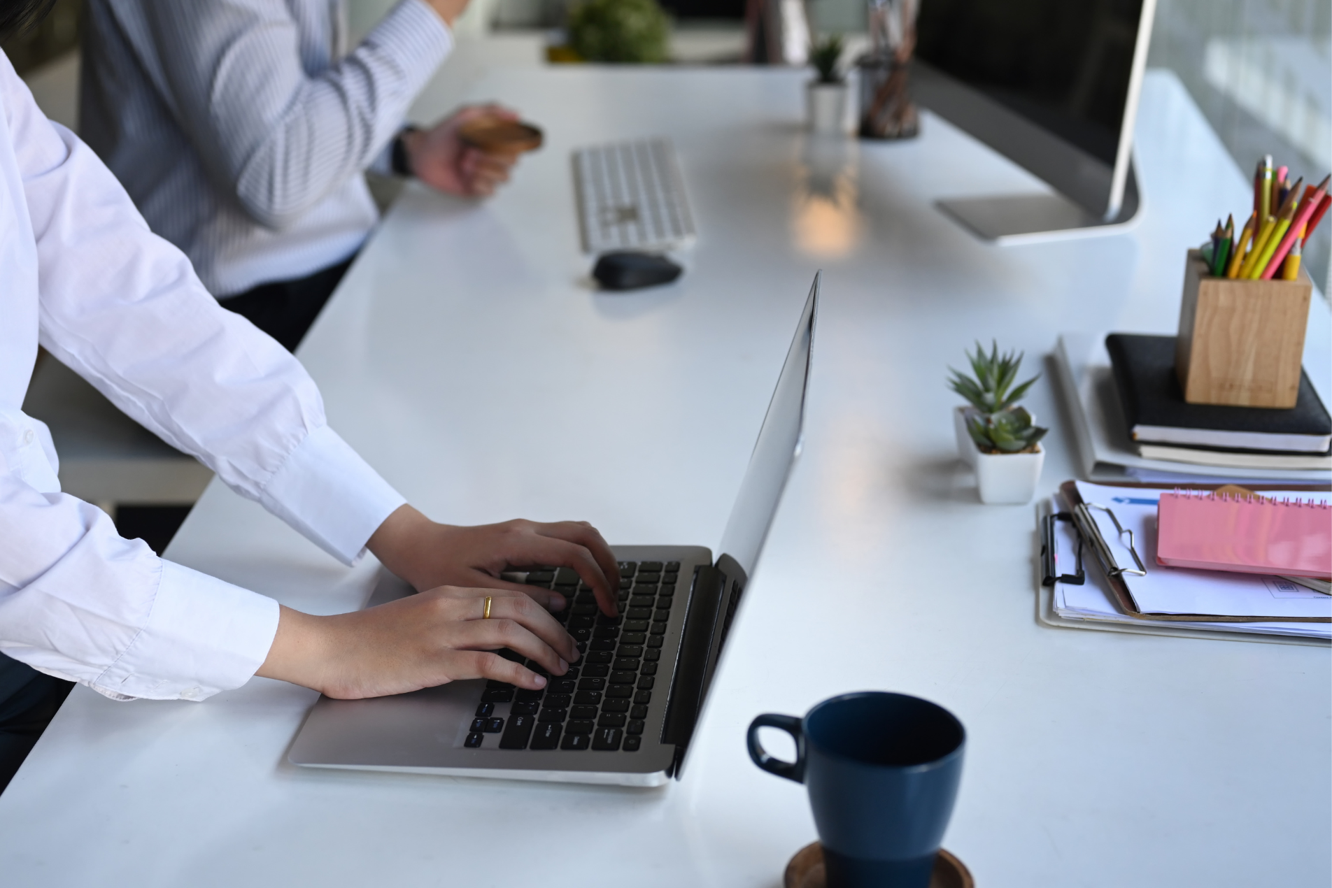 Consultant working at a desk.