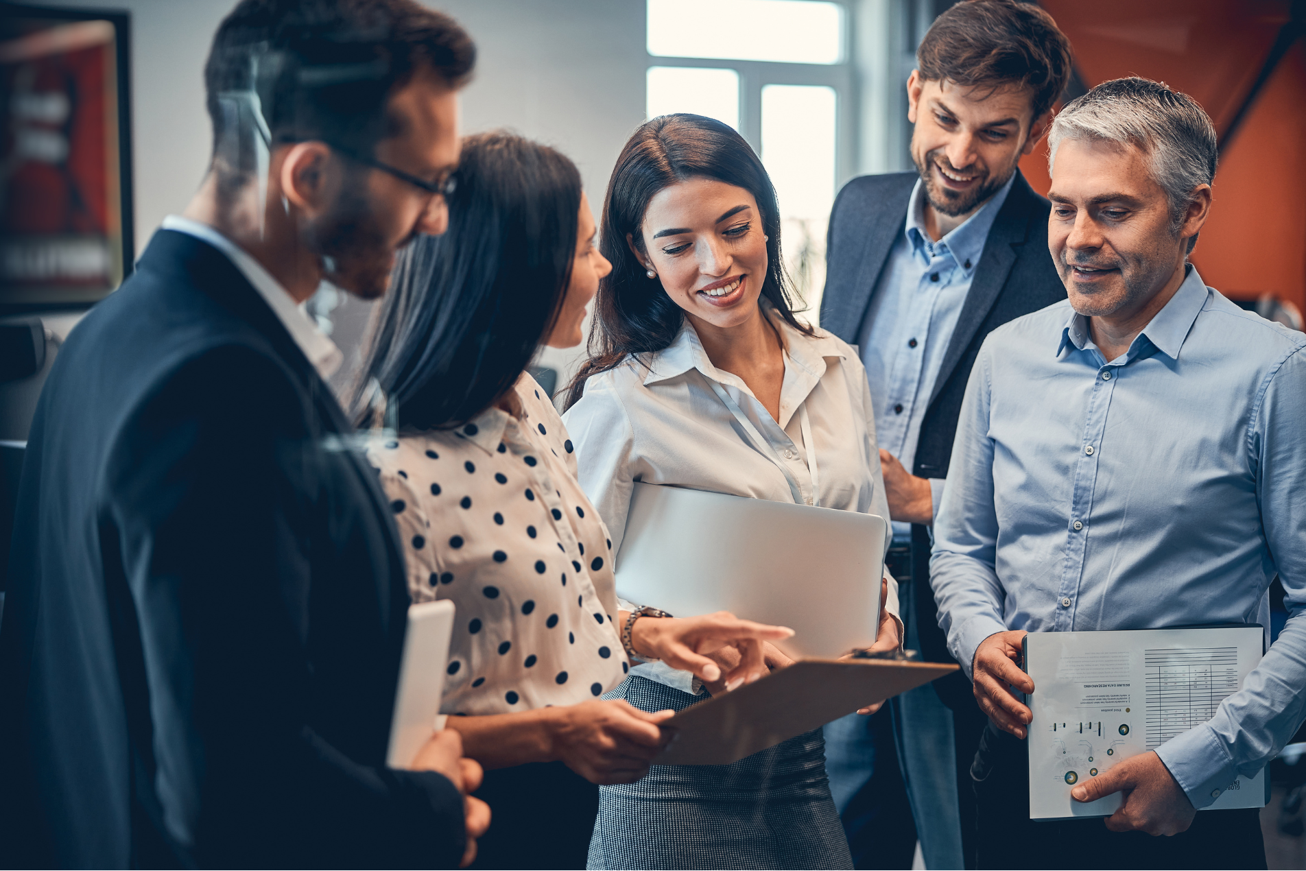 Consultant meeting with a client, providing expert advice and discussing solutions in an office setting.