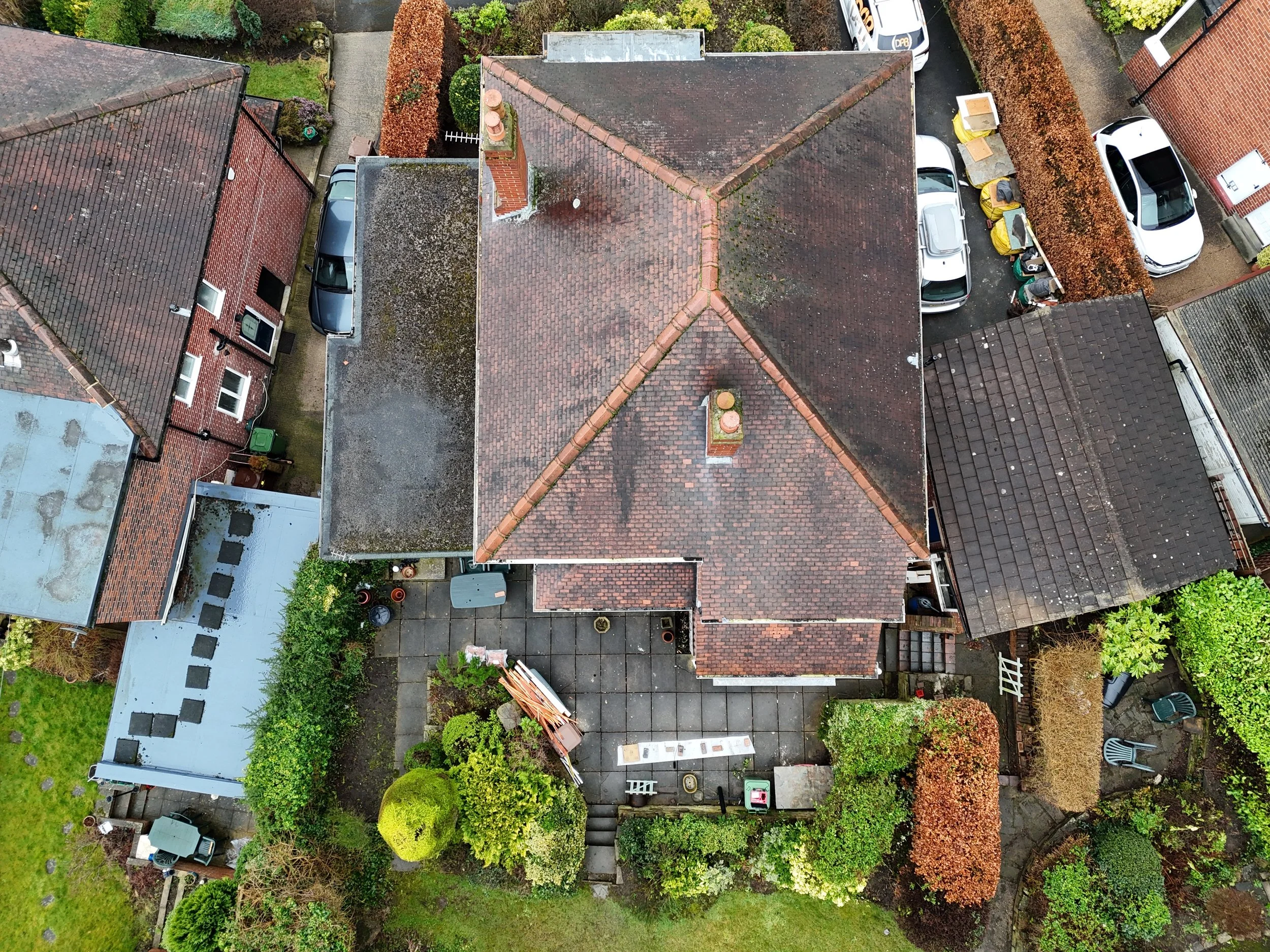 large dethatched house roof being inspection