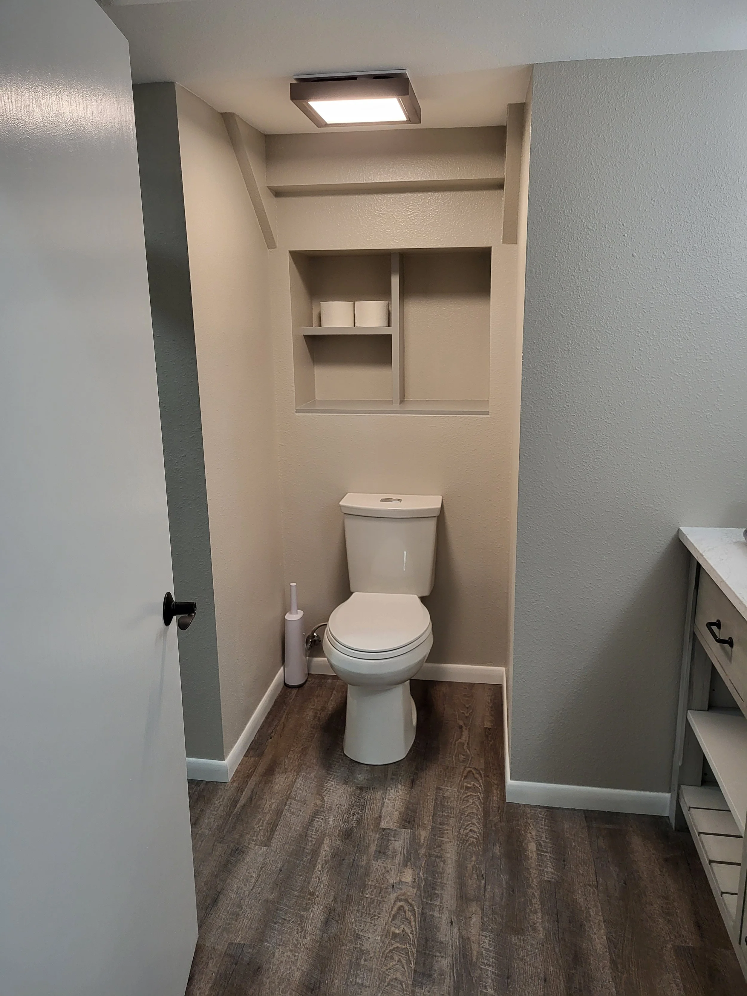 A cute basement bathroom with everything new.