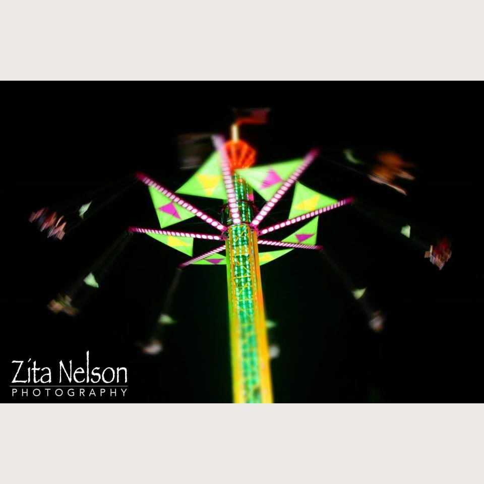 Abstract photo of a carnival swing ride
