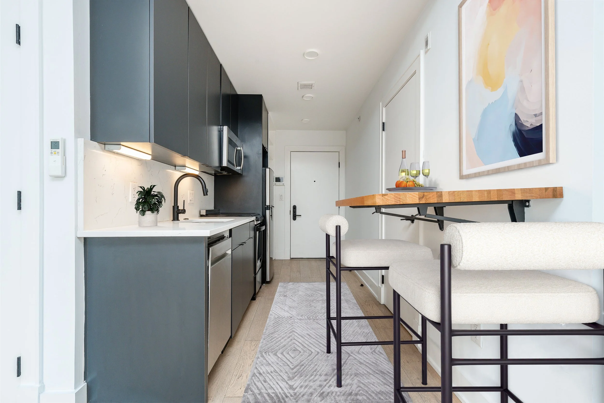 The modern chef's kitchen of a studio apartment at the Avenue in Fishtown, located on Frankford Avenue in Philadelphia's most dynamic neighborhood.
