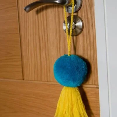 Turquoise Pom Pom with Yellow Tassel