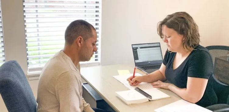 Therapist with an adult patient