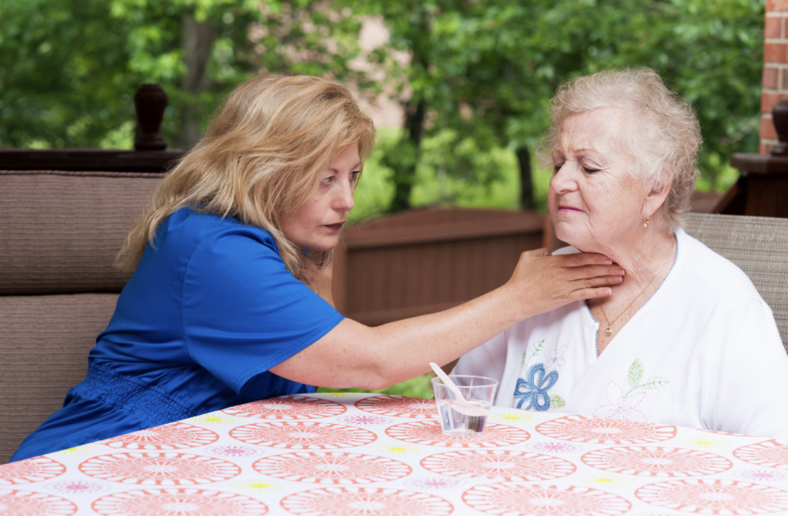 Woman doing speech therapy with patient