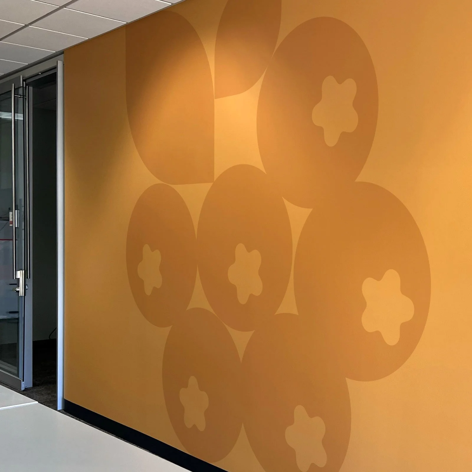 Subtle environmental graphics icon using scaled iconography and tone-on-tone pattern to add depth and rhythm.