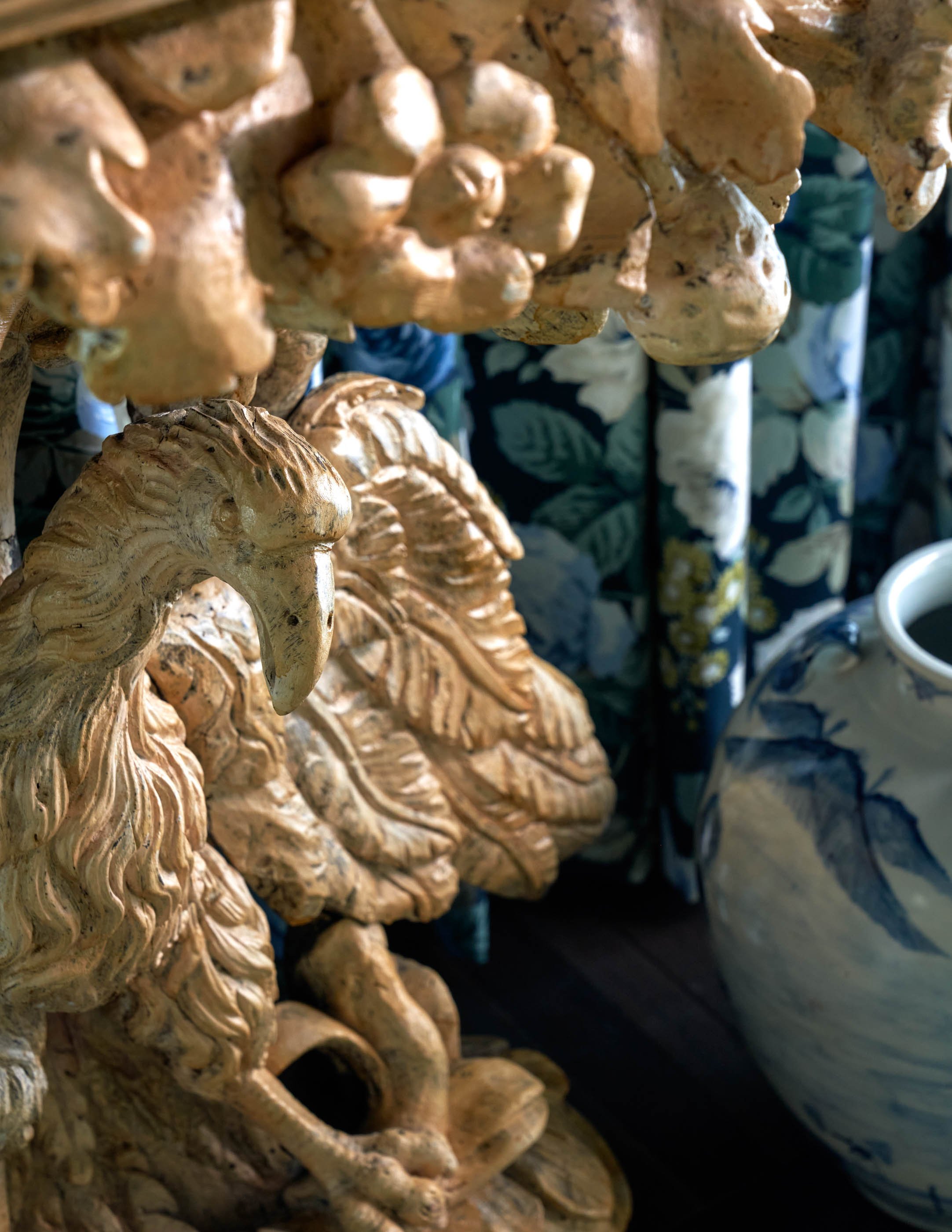Close-up of dried ginseng roots hanging in a row with a blurred background.
