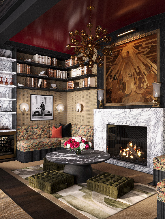 Living room with a fireplace, marble mantel, bookshelves, abstract art, floral couch, and a dark round table with flower arrangement.