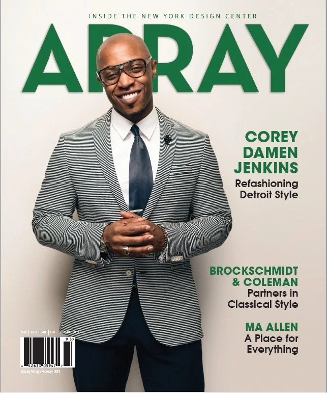 Cover of A+R Magazine featuring Corey Damen Jenkins, smiling and wearing a striped blazer and glasses, with headlines about interior design and partners Brockschmidt & Coleman.