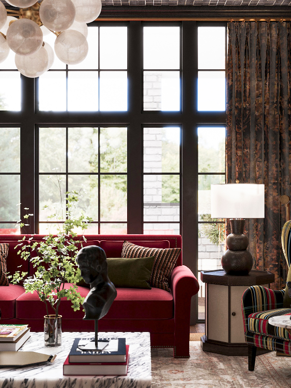 Living room with large black window panes, red sofa with cushions, a marble-top coffee table, a decorative bust, a potted plant, and a table lamp with a textured base, in a stylish interior with patterned curtain.