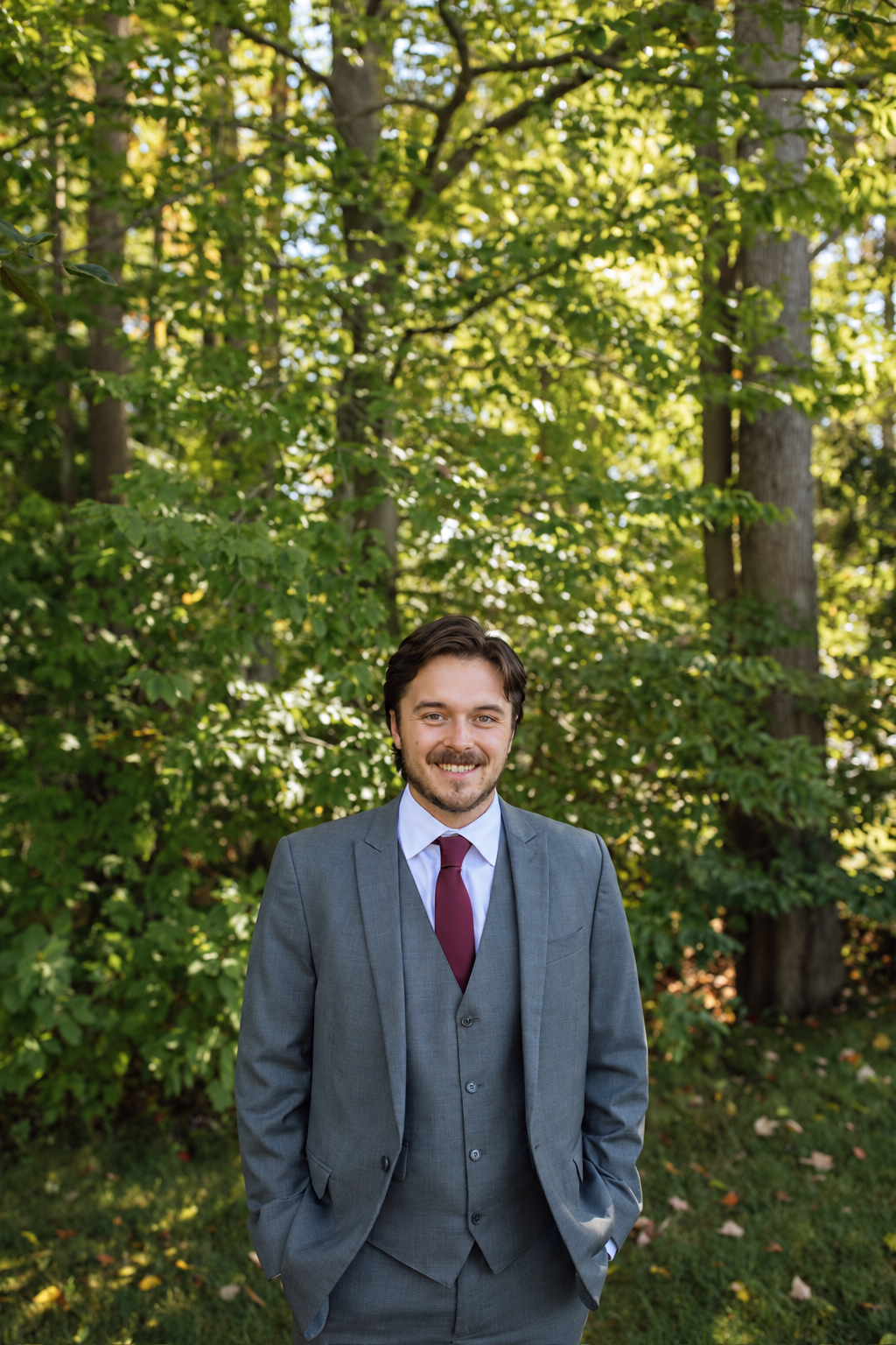 A man in a gray suit