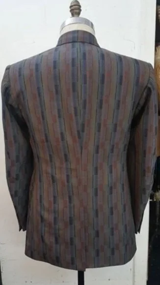 Back of a men's blazer with multi-colored vertical stripes