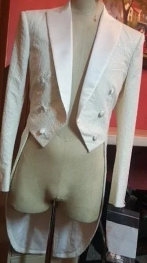 White blazer with textured fabric on a dress form
