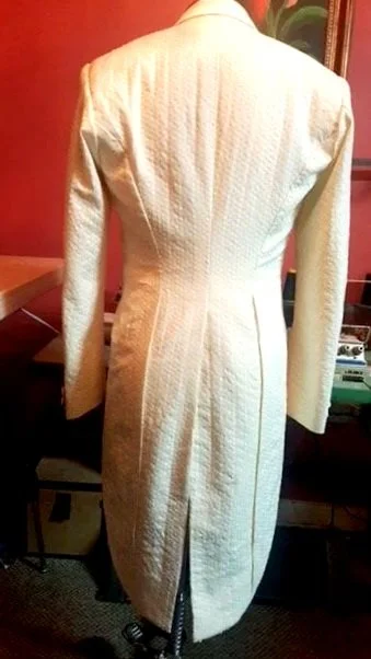 A cream-colored textured coat.