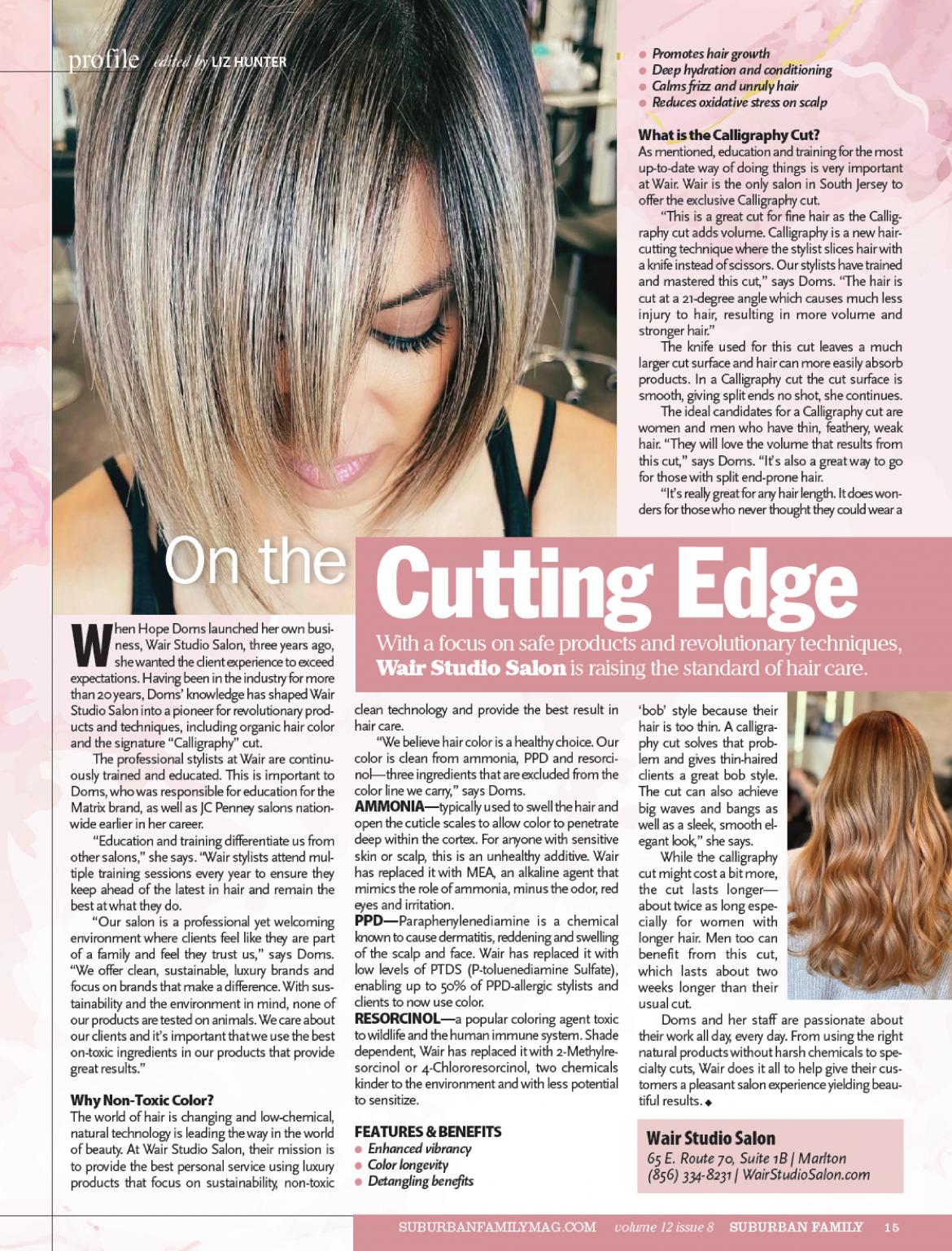 Close-up of a woman with shoulder-length hair and side-swept bangs, looking down, in a salon setting.