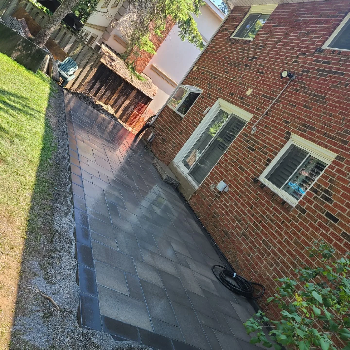 The plan for this patio is hot tub and a path to the outdoor rink.  Sounds like a great winter.