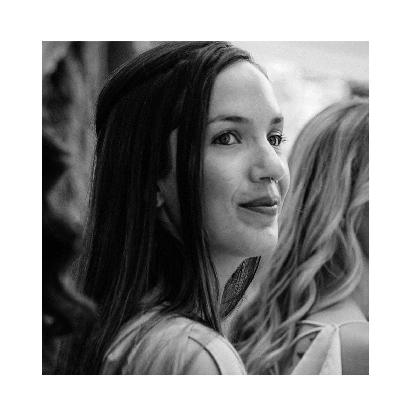 A portrait of Megan Farmer, Seattle based documentary-style wedding and family photographer.