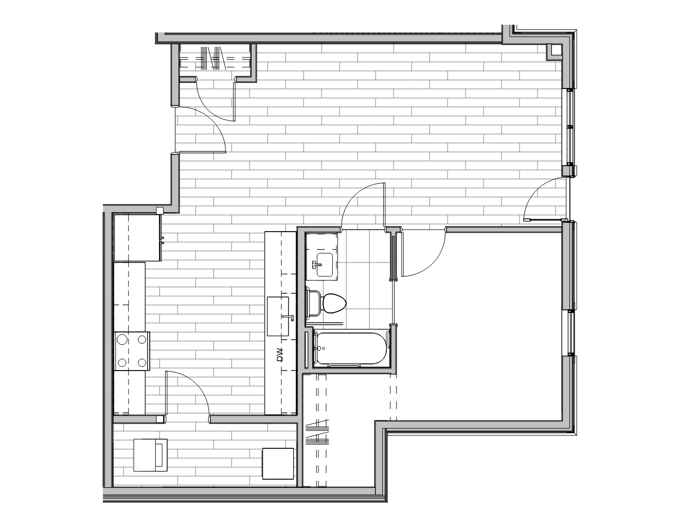 Floor plan of a small apartment with a kitchen, bathroom, living area, and bedroom.