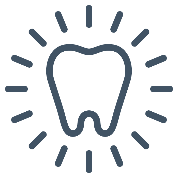 Icon of a tooth with a circle of rays around it