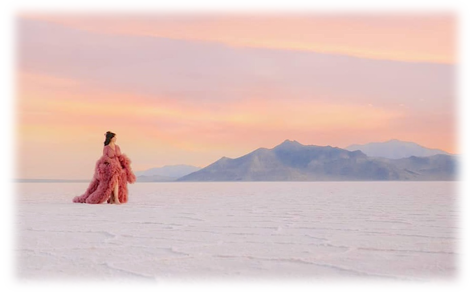 Portrait of the artist in the desert under a sunset.