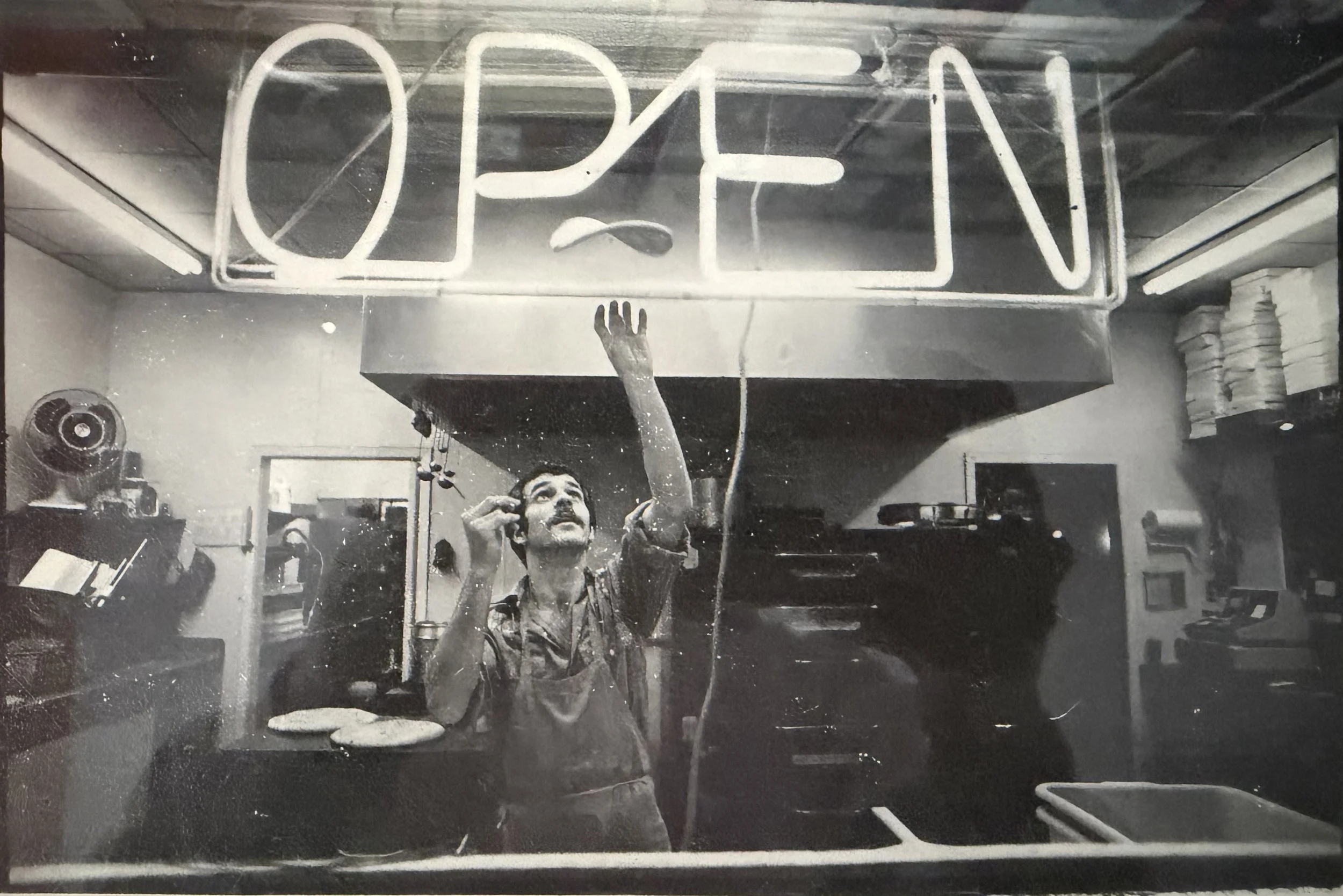 Coach Lord tossin' pies at his pizza place back in the day.