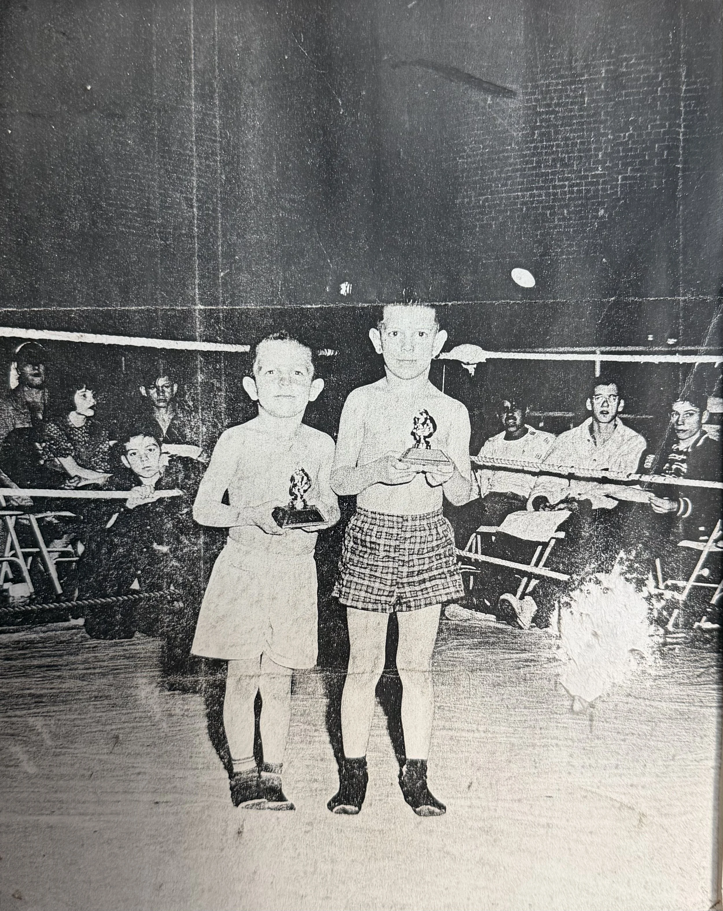 Richard's taking home the trophy from his first fight at 5 years old. 
