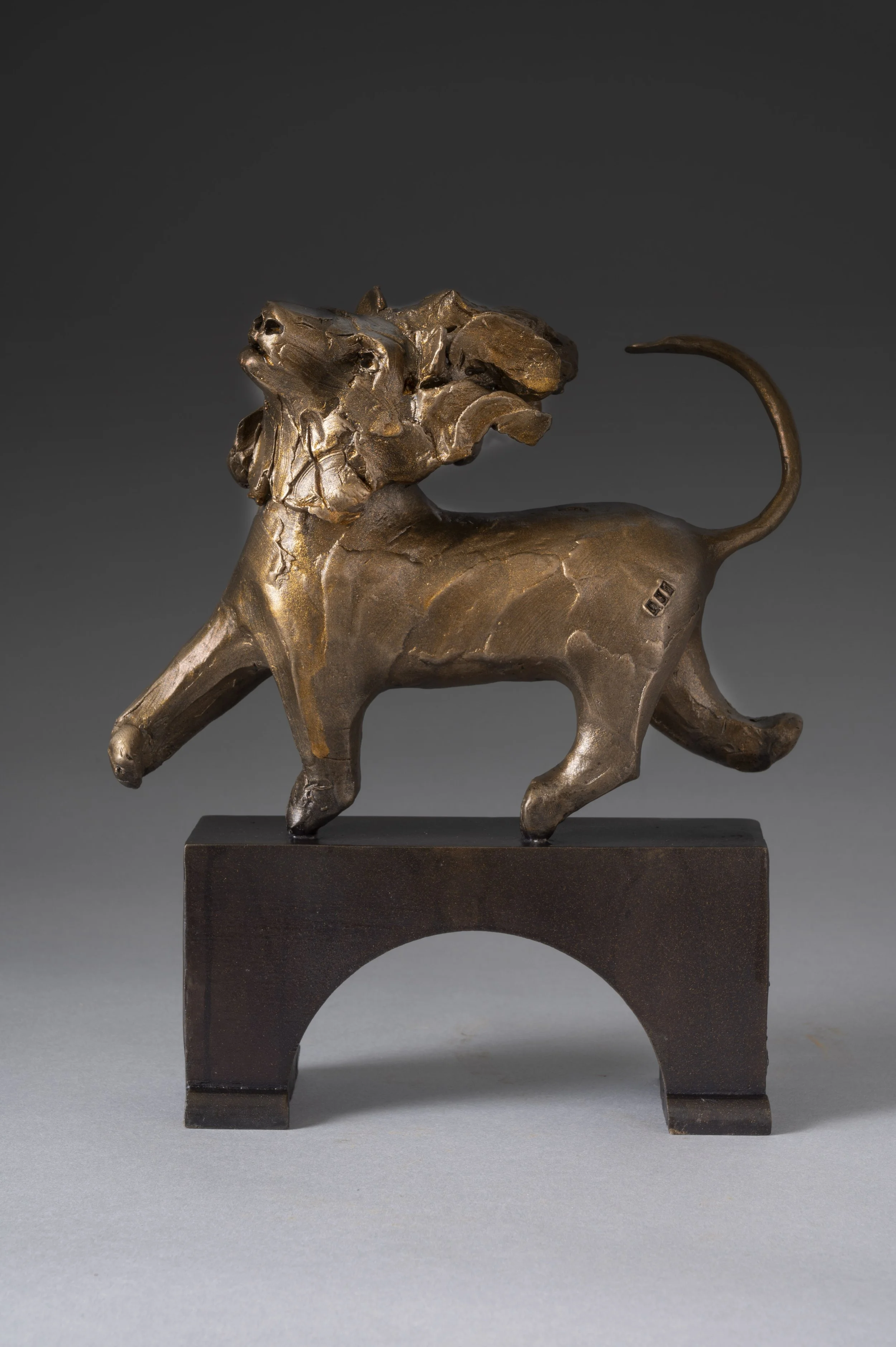 Lion in the Wind - 7½” L x 3" W x 8½” H