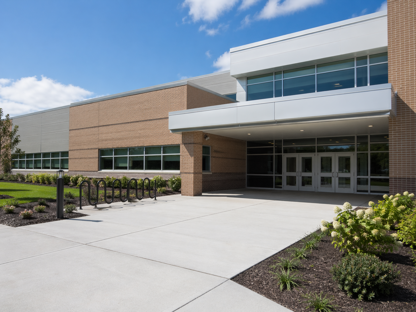 Apex Pest Management technician performing pest control service at a school in Denver, Colorado.