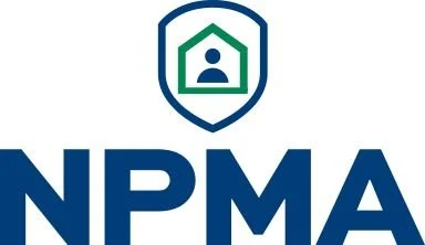 NPMA logo featuring a house with a person inside, encased in a shield design.