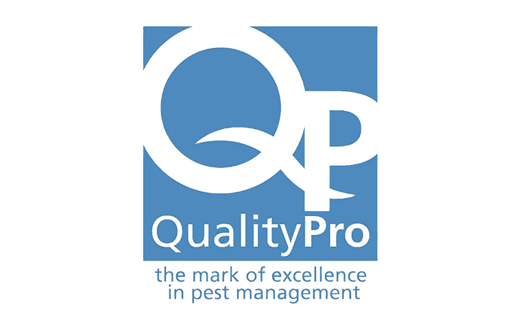 QualityPro pest management certification logo with a stylized magnifying glass and the tagline 'the mark of excellence in pest management'.