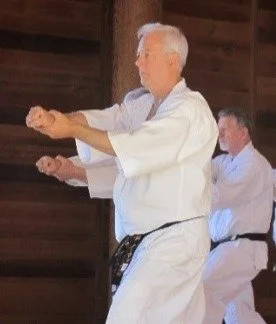 Shihan Norman Welch and Ron Thom, both fifth degree black belts in Shotokan Karate practicing