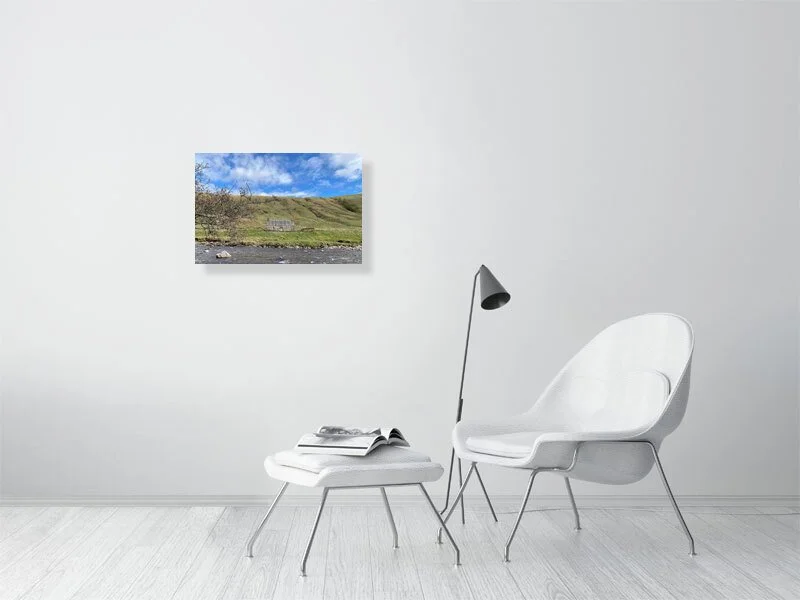 Sample print of a photograph of a stone cottage under a bright blue sky on the bank of the River Tilt in Scotland.