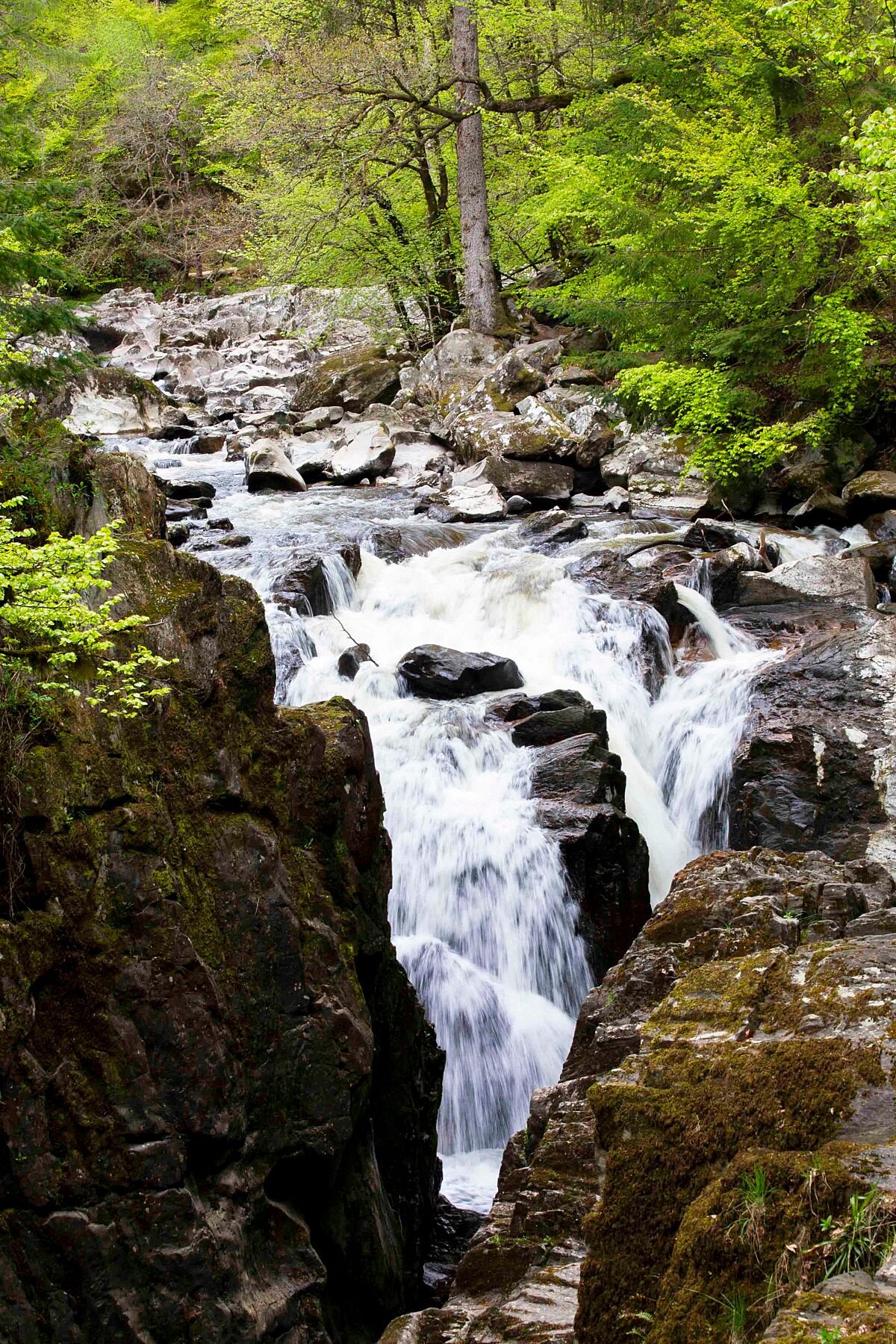 Scenic photograph of Odin's Falls waterfall in Perthshire, Scotland.
